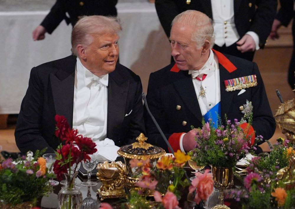 Britain's King Charles, right, and U.S. President Donald Trump speak at a State Banquet in Windsor Castle, England, on day one of U.S. President Donald Trump and First Lady Melania Trump's second state visit to the UK, Wednesday Sept. 17, 2025. (Yui Mok/PA via AP, Pool Photo via AP)