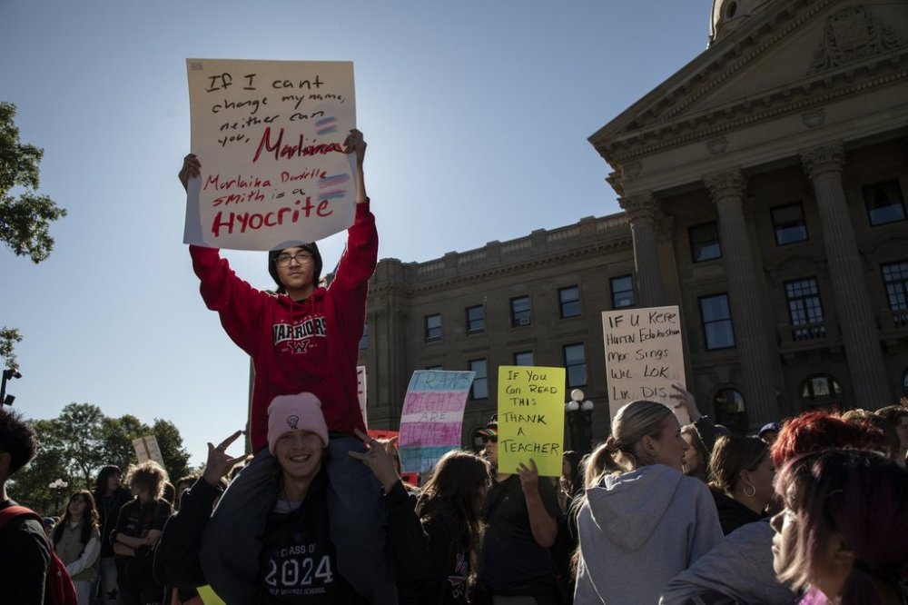 Dominic Kaleb Meyers, 17, protests in support of pay for teachers and funding for schools at the Alberta legislature in Edmonton on Monday, Sept. 22, 2025. THE CANADIAN PRESS/Amber Bracken