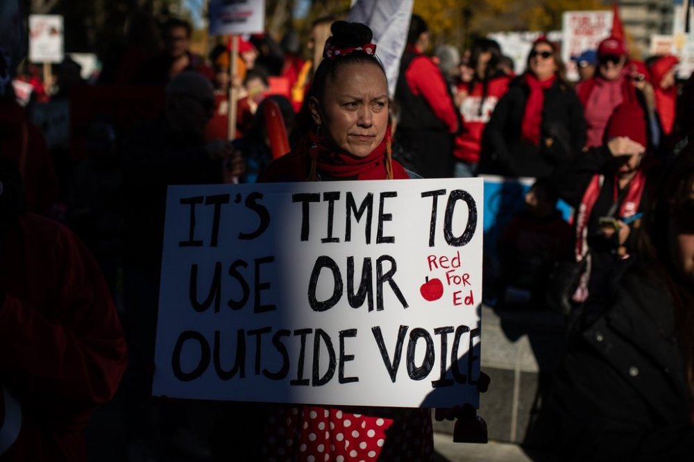 Teachers and supporters take part in a rally on World Teachers' Day in Edmonton, on Sunday, Oct. 5, 2025. THE CANADIAN PRESS/Jason Franson