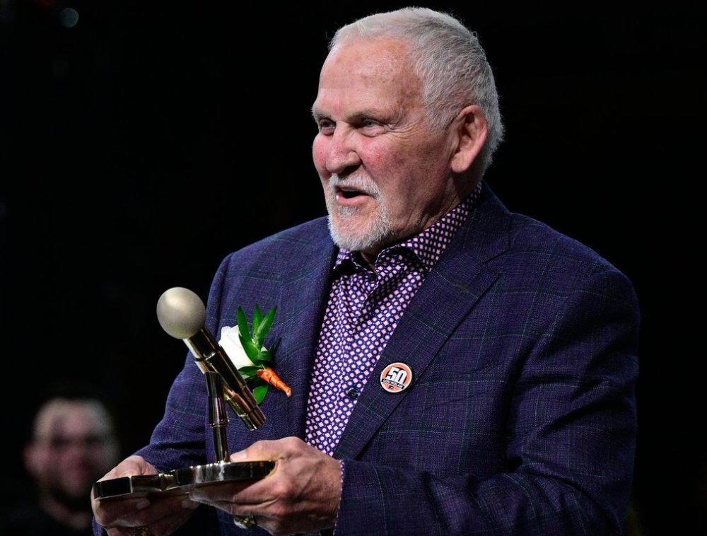 FILE - Former Philadelphia Flyers goalie Bernie Parent during a ceremony for public address announcer Lou Nolan prior to an NHL hockey game against the Anaheim Ducks, Saturday, April 9, 2022, in Philadelphia. (AP Photo/Derik Hamilton, File)