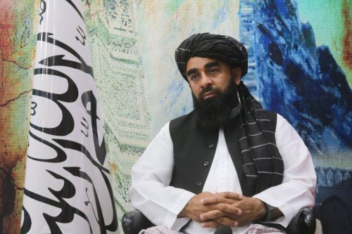 FILE - The Taliban's spokesman, Zabihullah Mujahid, sits during an interview in Kandahar, Afghanistan, on Aug. 14, 2023. (AP Photo/Abdul Khaliq, File)