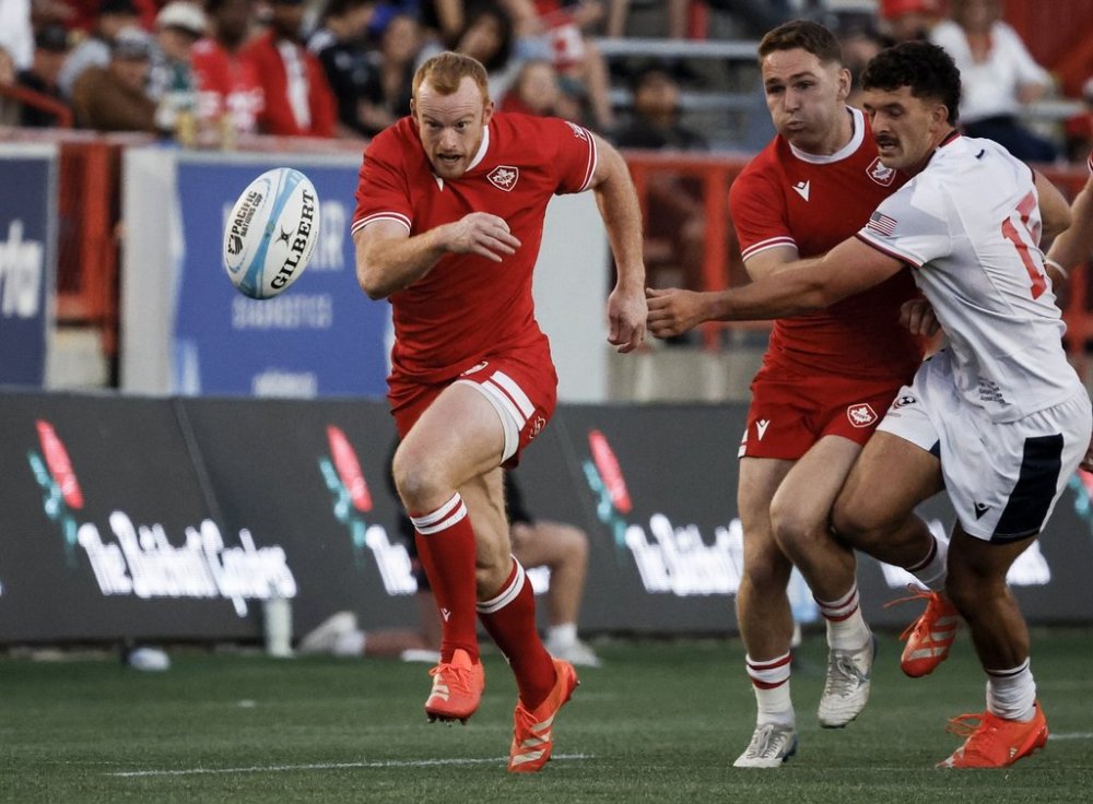 United States' Erich Storti, right, tries to get to Canada's Peter Nelson, left, before he scores a try during second half Pacific Nations Cup rugby action in Calgary, Alta., on Friday, Aug. 22, 2025.THE CANADIAN PRESS/Jeff McIntosh