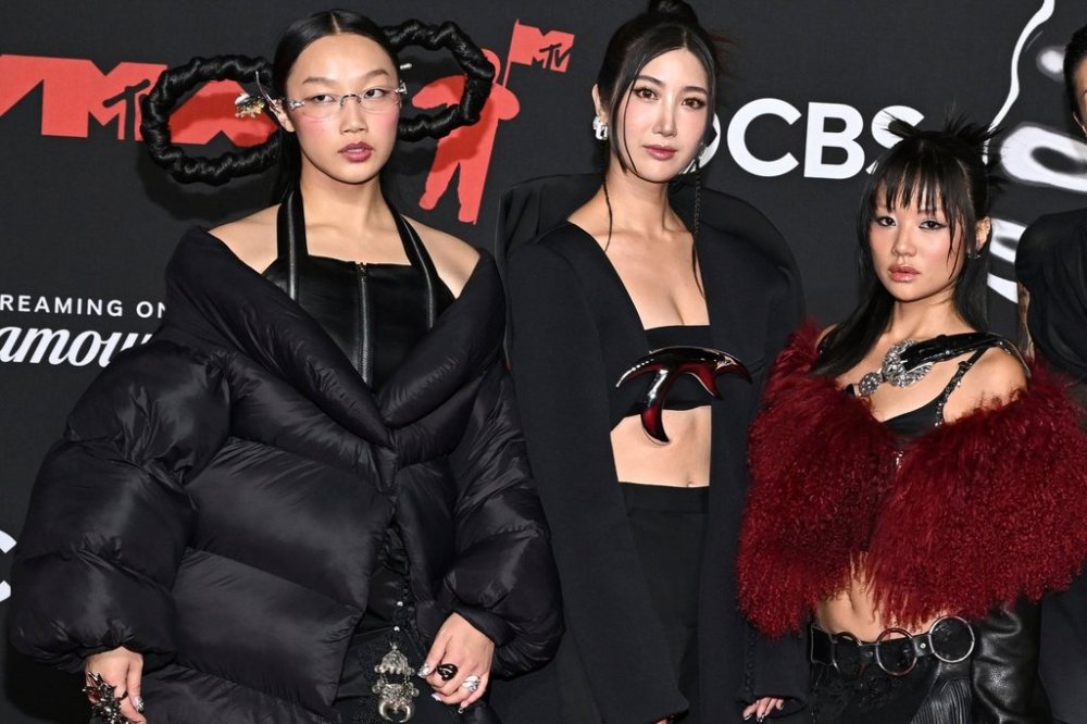 FILE - Audrey Nuna, from left, Ejae, and Rei Ami from
