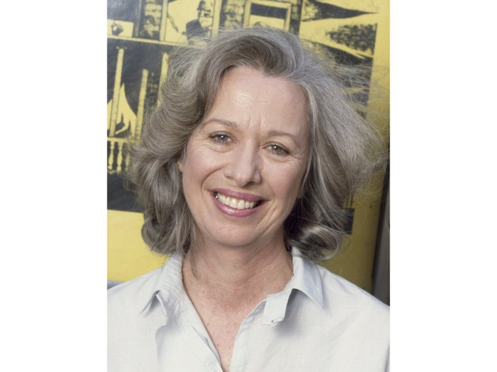 FILE - Actor Polly Holliday appears outside the 46th Street Theater in New York on July 15, 1986. (AP Photo/Waring Abbott, File)