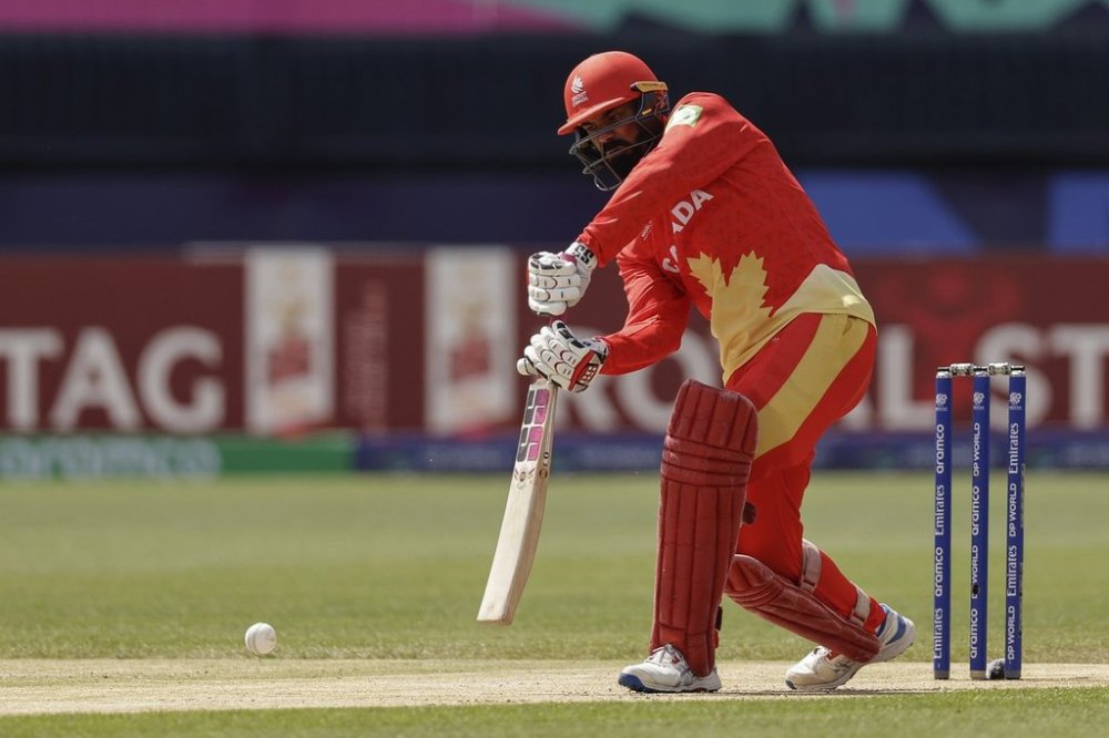 Canada's Navneet Dhaliwal bats against Ireland during an ICC Men's T20 World Cup cricket match at the Nassau County International Cricket Stadium in Westbury, New York, Friday, June 7, 2024. (AP Photo/Adam Hunger)