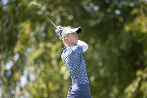 Nelly Korda tees off on the seventh hole during the first round of the Kroger Queen City Championship golf tournament, Thursday, Sept. 11, 2025, at TPC River's Bend in Cincinnati. (AP Photo/Tanner Pearson)