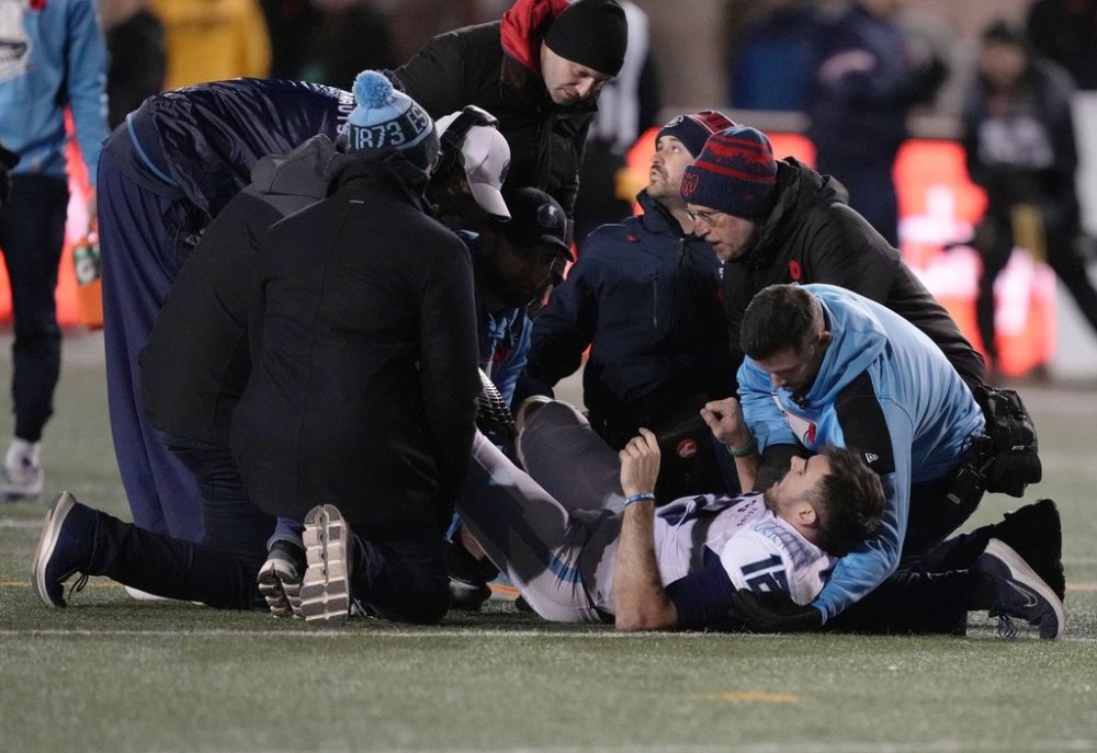 Toronto Argonauts quarterback Chad Kelly (12) is tended to by medical staff after being injured during third-quarter CFL Eastern Conference Final football action against the Montreal Alouettes Saturday, Nov. 9, 2024 in Montreal. THE CANADIAN PRESS/Christinne Muschi