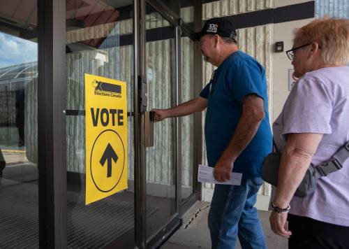 Voters in lower socioeconomic groups are focused on the economy, new research suggests. When politicians don’t prioritize the economy, they don’t turn out to vote. (The Canadian Press files)
