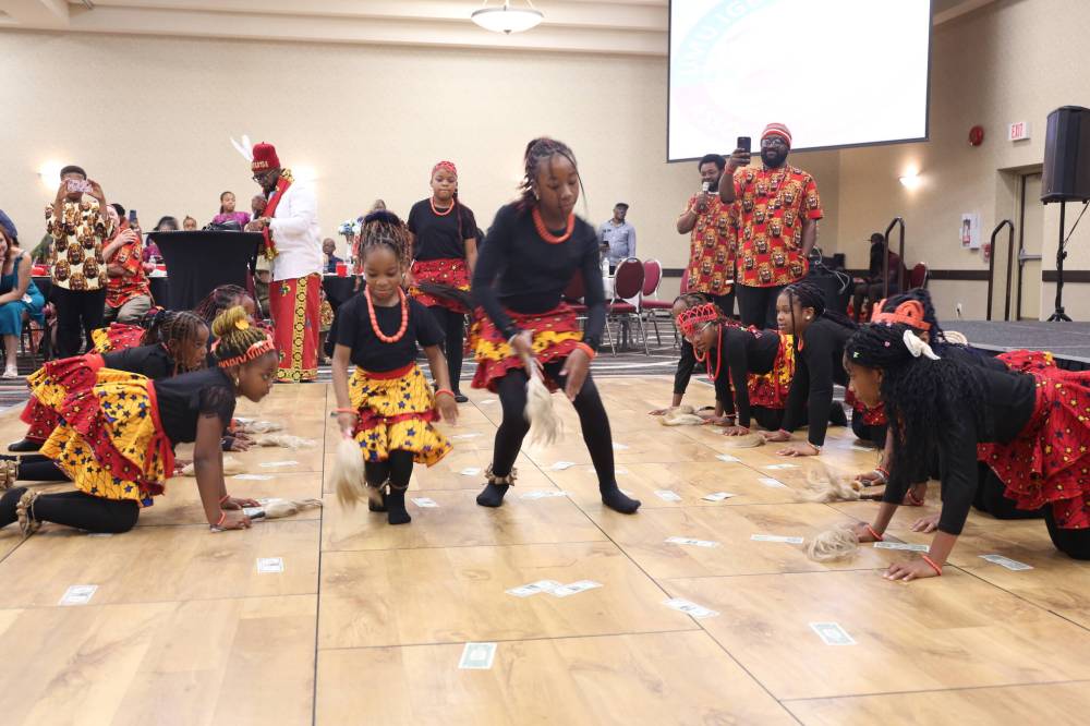 Children of Umu Igbo Brandon Association members dance to traditional songs. (Abiola Odutola/The Brandon Sun)