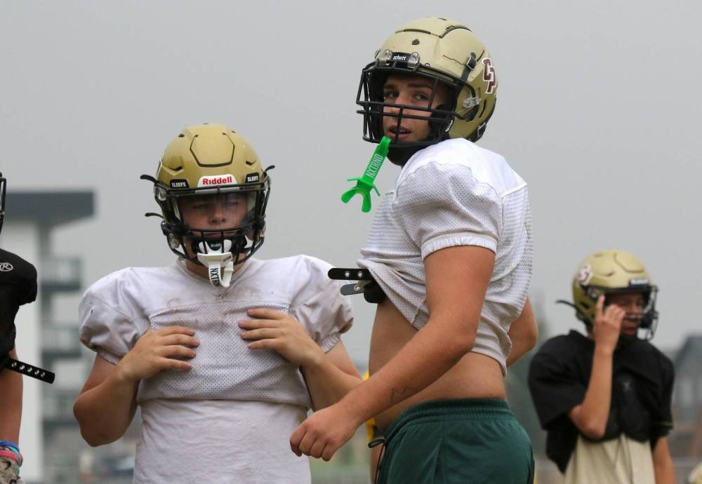 Crocus Plainsmen defensive lineman Kayden MacEachern, right, is heading into his third year as a starter in Winnipeg High School Football League varsity play this year. (Thomas Friesen/The Brandon Sun)