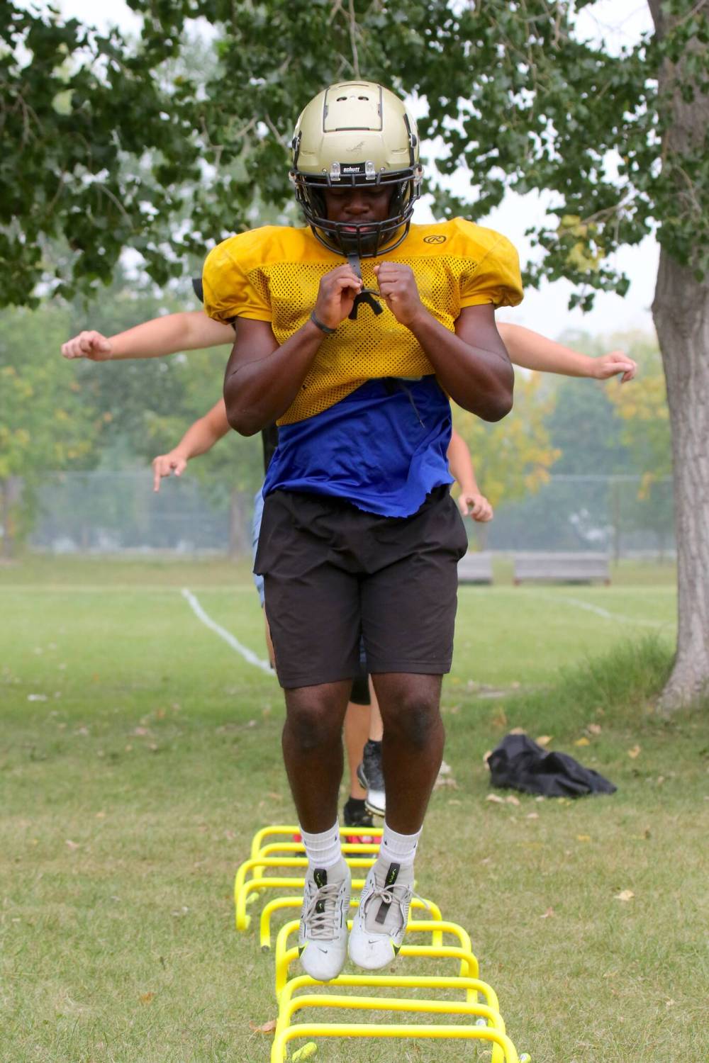 Muqtadir Apena hops over hurdles during Crocus Plainsmen football practice on Tuesday. (Thomas Friesen/The Brandon Sun)