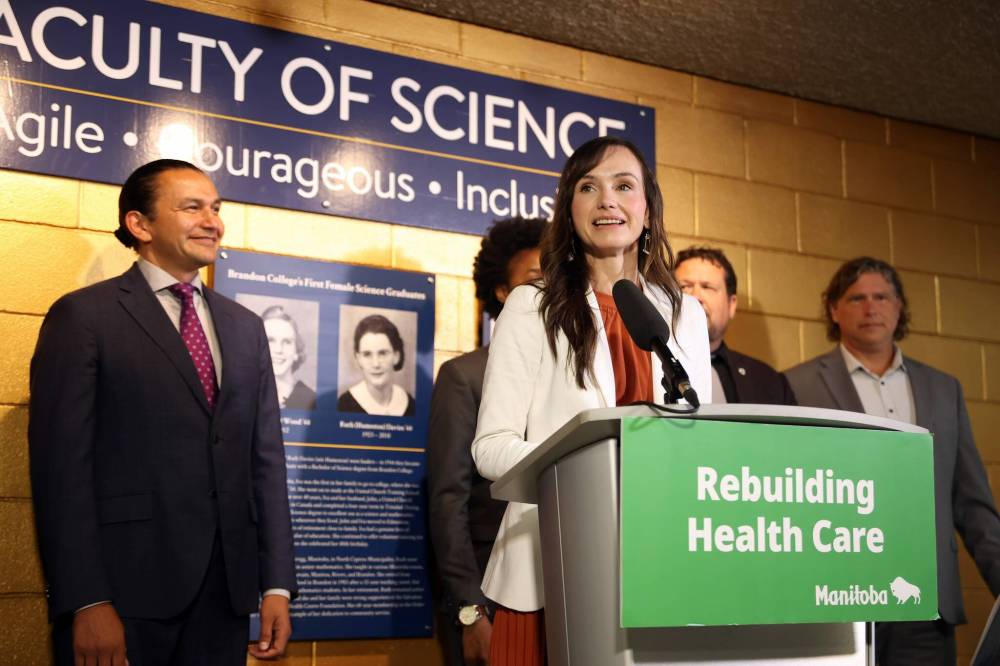 Advanced Education Minister Renée Cable, seen here at the podium during a July announcement at Brandon University’s Brodie Science Centre, says the provincial government is working to strengthen the oversight role of university boards. (Tim Smith/The Brandon Sun files)