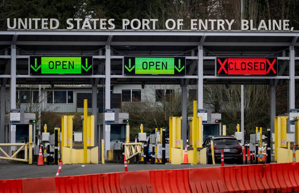 A car waits at the United States-Canada border near Surrey B.C., in March. (The Canadian Press files)