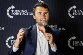 Charlie Kirk speaks during a town hall meeting in Oconomowoc, Wis., in March 2025. Kirk was shot and killed Wednesday during an appearance on a university campus in Utah. (The Associated Press files)
