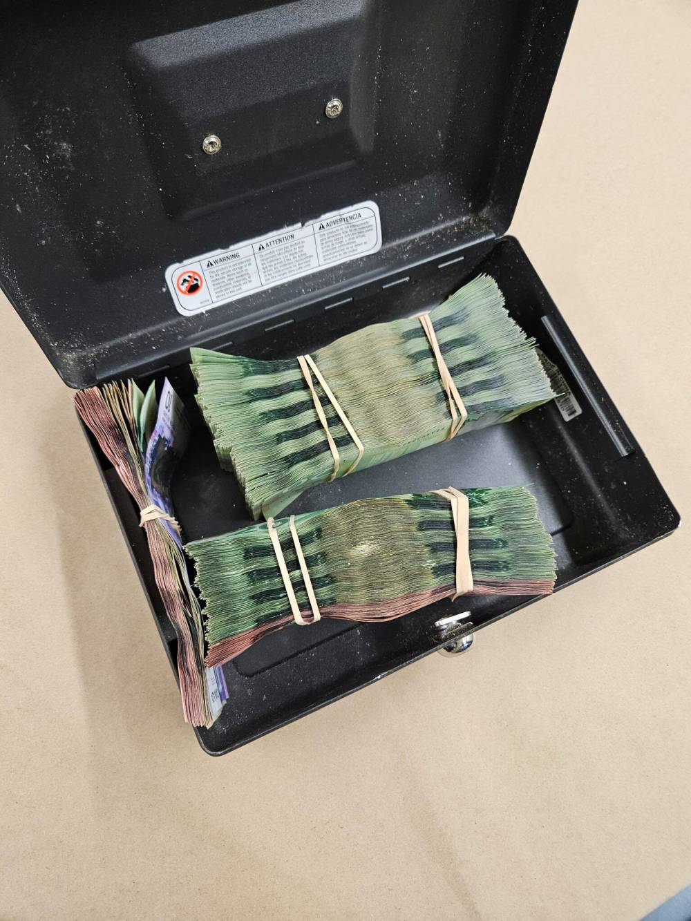 Cash seized from traffic stop in Swan River. (Supplied)