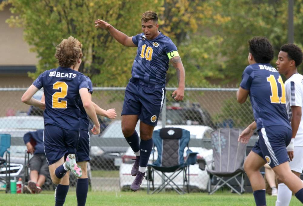 Camilo Rodriguez (10) celebrates one of his four goals during the Brandon University Bobcats men's soccer home opener against the Providence Pilots on Saturday. (Thomas Friesen/The Brandon Sun)
