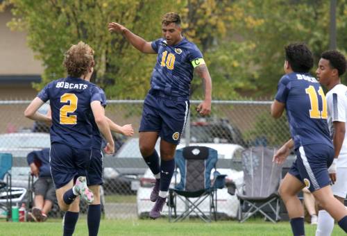 Camilo Rodriguez (10) celebrates one of his four goals during the Brandon University Bobcats men’s soccer home opener against the Providence Pilots on Saturday. (Thomas Friesen/The Brandon Sun)