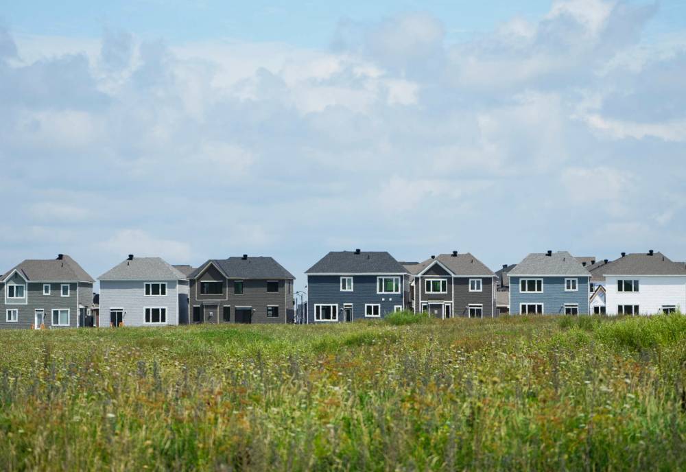 A row of new homes is pictured in Ottawa in August of 2023. The Canadian Real Estate Community land trusts could be a game-changer in Canada’s affordable housing crisis. (The Canadian Press files)