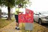 Letter carrier Tyler Stephens at a Canada Post mailbox in Brandon on Monday morning. CUPW has argued that the elimination of flyer delivery is about protecting postal workers from low-value work that distracts from core services. (Tim Smith/The Brandon Sun)