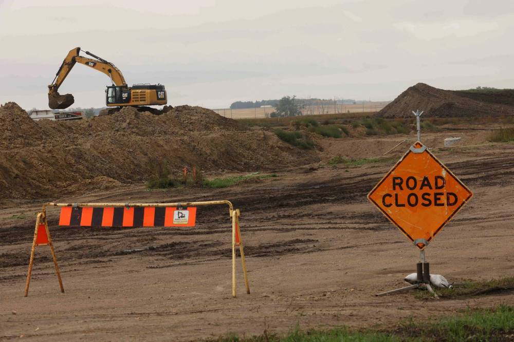 Work is done west of 34th Street in Brandon’s south end on a development that will include a new K-8 school. (Tim Smith/The Brandon Sun)