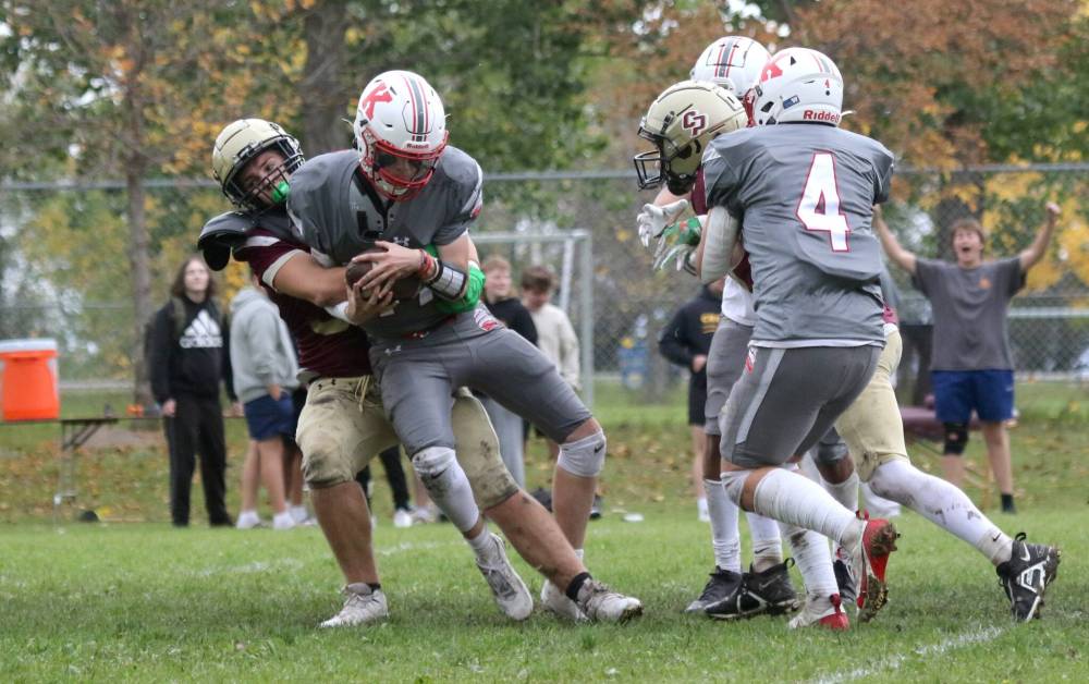 Crocus Plainsmen Kayden MacEachern sacks Kelvin Clippers quarterback Parker Epp. (Thomas Friesen/The Brandon Sun)