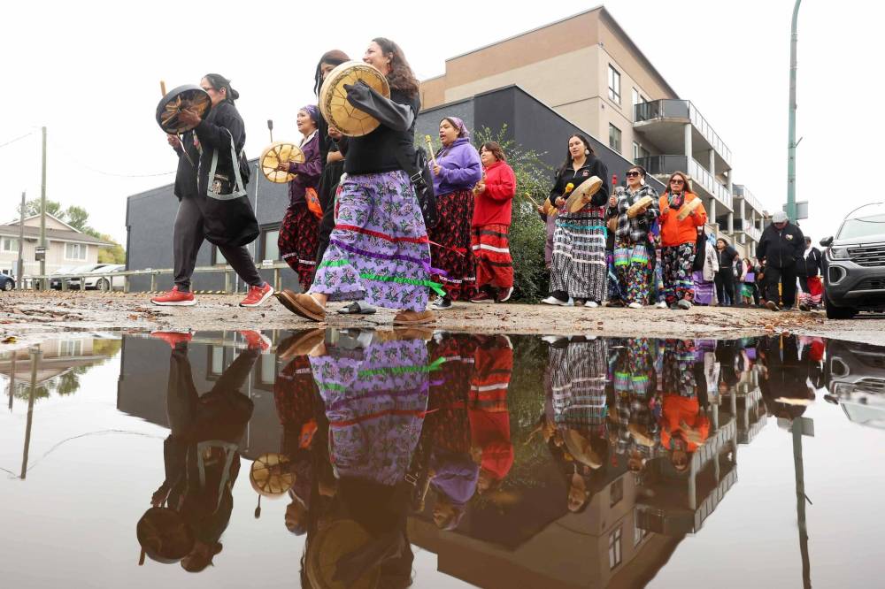 Participants in the annual Grandmothers Walk in Brandon walk along Ninth Street on Friday. The event, which started and ended at Princess Park, aims to raise awareness about sexual exploitation in Brandon and included speakers, drumming and a walk followed by a lunch. (Tim Smith/The Brandon Sun)