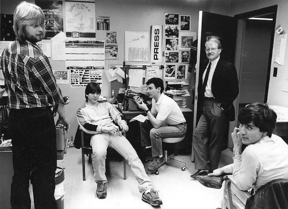 Dirk Aberson seemed to be amused with the antics of young photographers. He documented a mid-1980s moment in time in The Brandon Sun studio/darkroom, when Red River Community College photo students from Winnipeg were on a work experience program.Staff photographer James O’Connor (from left), student Joe Bryksa, staff photographer Greg Southam, business reporter Jeffrey Lewis and another student whose name is unknown. (Dirk Aberson/The Brandon Sun files)