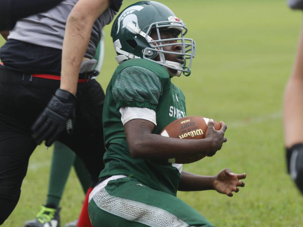 Following two fumbles in the first quarter, Emeka Onuke (8) went on to score two touchdowns for the Spartans while racking up more than 135 rushing yards. (Massimo De Luca-Taronno/The Brandon Sun)