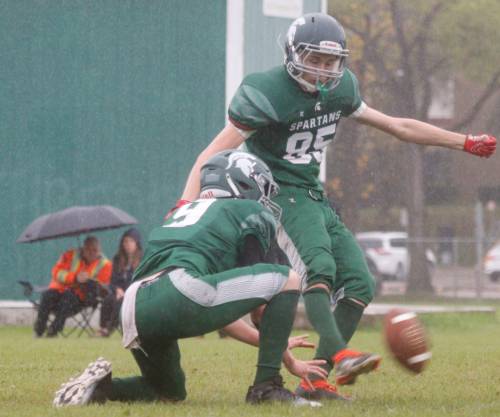 Spartans kicker and wide receiver Devin Lucas (85) kicks a field goal during Rural Manitoba Football League action at Neelin on Friday. (Massimo De Luca-Taronno/The Brandon Sun)