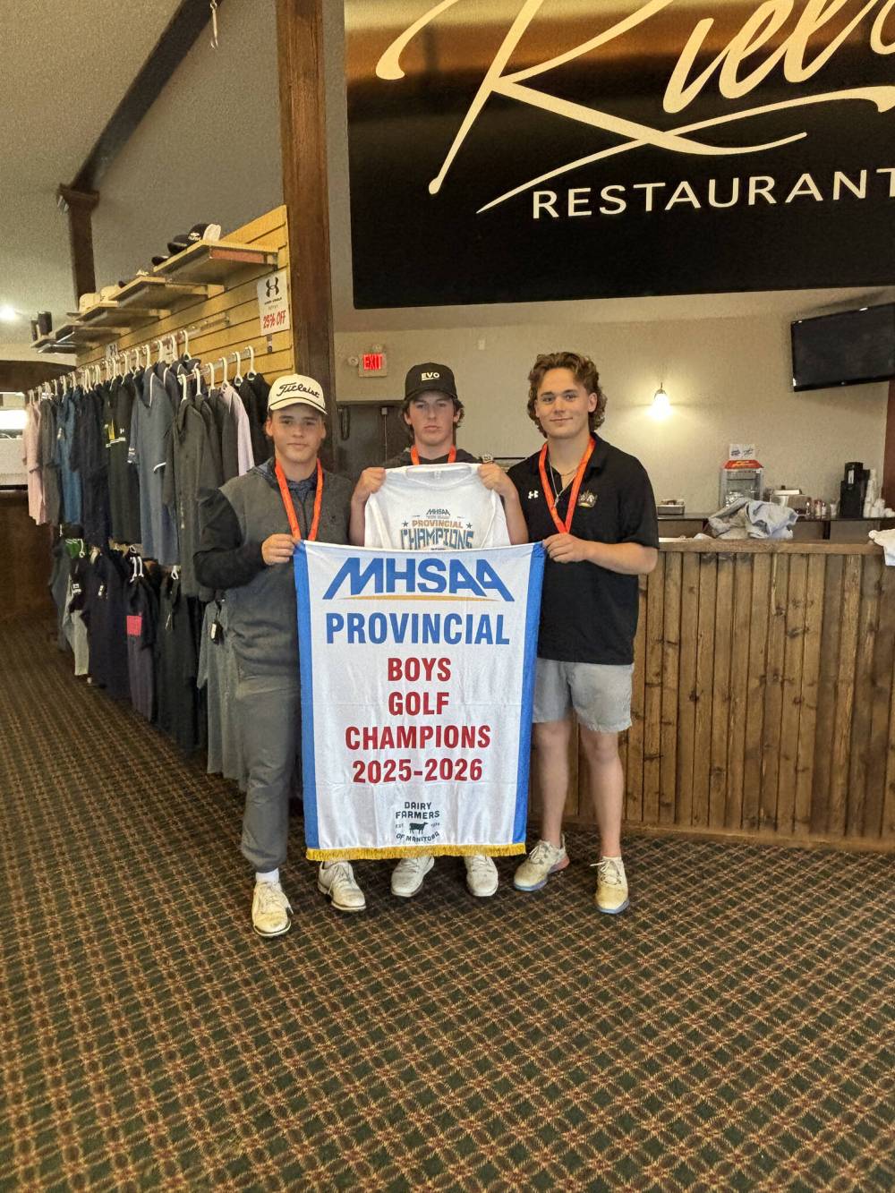 Hunter Oakden, from left, Daylan Duncalfe and Kale Jones of Vincent Massey won the MHSAA provincial boys’ golf title at Oak Island Resort on Friday. Submitted)