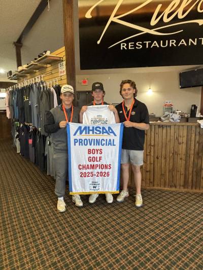 Hunter Oakden, from left, Daylan Duncalfe and Kale Jones of Vincent Massey won the MHSAA provincial boys’ golf title at Oak Island Resort on Friday. Submitted)