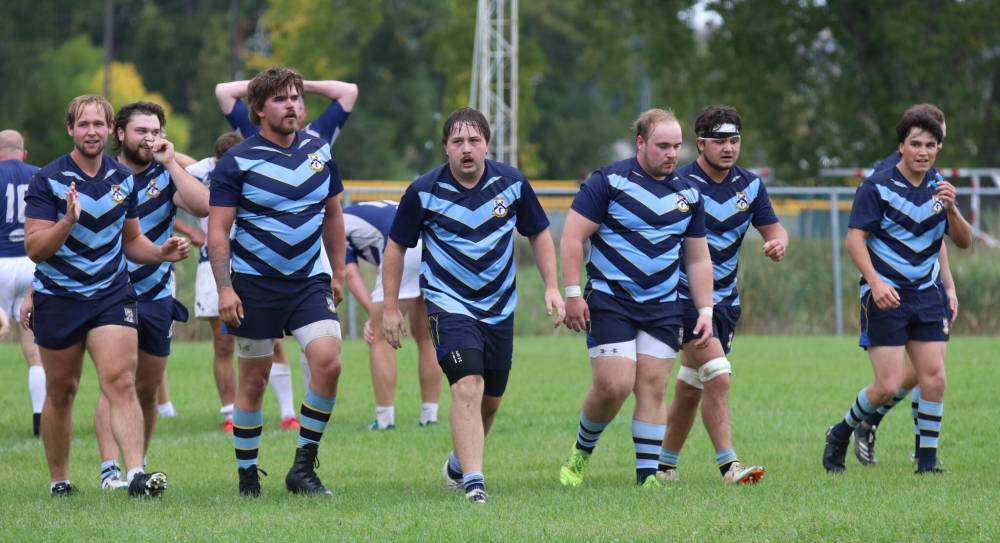 A group of the Brandon Barbarians — from left to right, Robin Roberts, Randy Cooke, Zach Davis, Keegan Pitcairn-Freiheit, Jacob Walters, Richard Pierreroy and Adam Pierreroy — head back up the field after Pitcairn-Freiheit's late try in their 46-22 semifinal victory over the Winnipeg Assassins on Saturday at John Reilly Field. (Perry Bergson/The Brandon Sun)