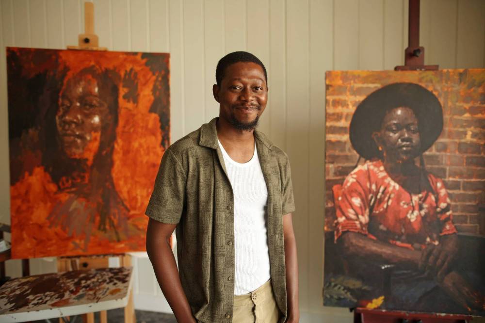 Artist Opeyemi Olukotun in his studio in downtown Brandon in August. (Tim Smith/The Brandon Sun)