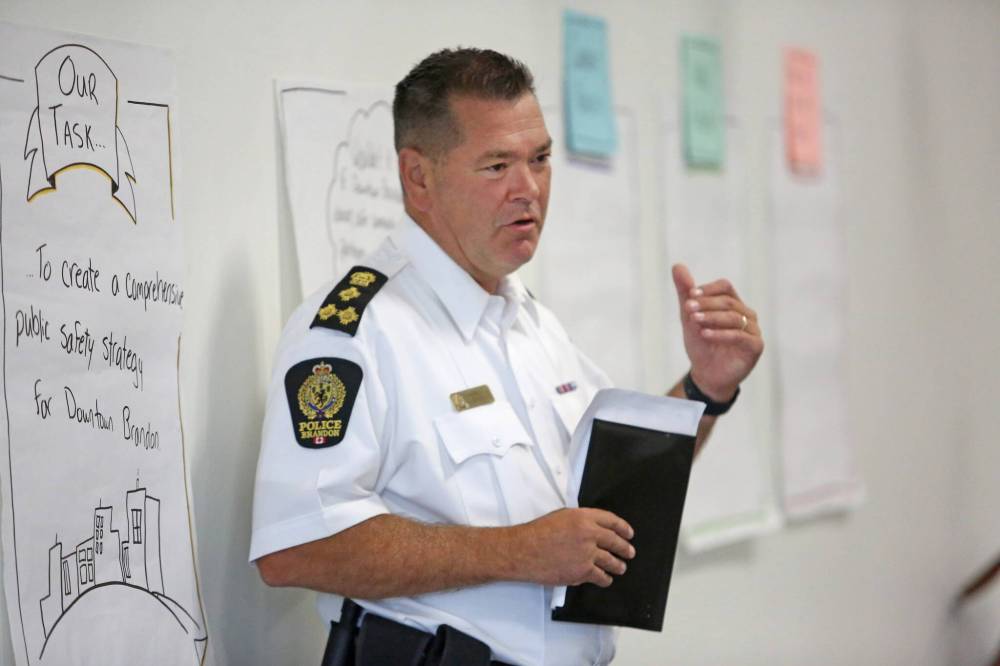 Brandon police Chief Tyler Bates greets downtown area residents who showed up to participate in a Downtown Public Safety Strategy meeting at the A.R. McDiarmid Civic Complex in July. (Matt Goerzen/The Brandon Sun files)