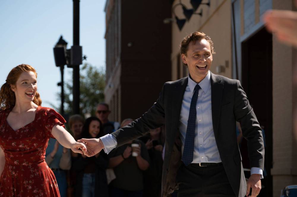 Tom Hiddleston (right) and Annalise Basso are shown in a scene from “The Life of Chuck,” which screens this weekend at the Evans Theatre. (Neon)
