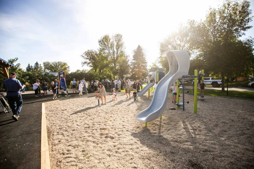 The Friends and Family Playground in Carman features a granite plaque engraved with a QR code, directing people to a webpage with photos of the Clearwater family and resources for victims of domestic abuse. (Photos by Mikaela MacKenzie/Winnipeg Free Press)