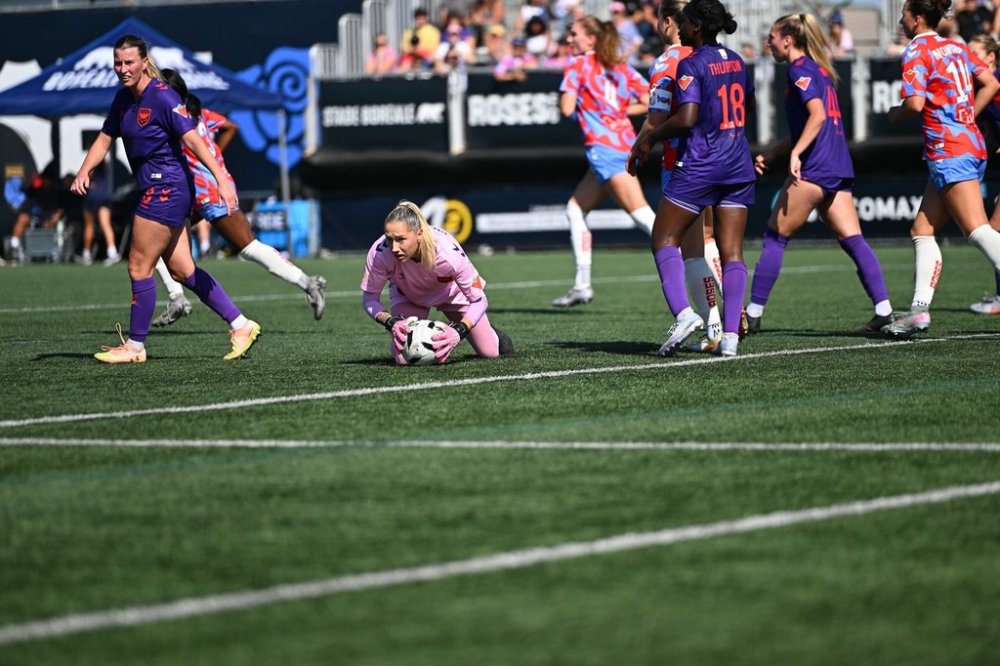 Montreal Roses FC goalkeeper Anna Karpenko guards the ball during the Roses' game against Calgary Wild FC, in Montreal, in a Saturday, Sept. 27, 2025, handout photo.
THE CANADIAN PRESS/Handout - Calgary Wild FC, Tim Austen (Mandatory Credit)