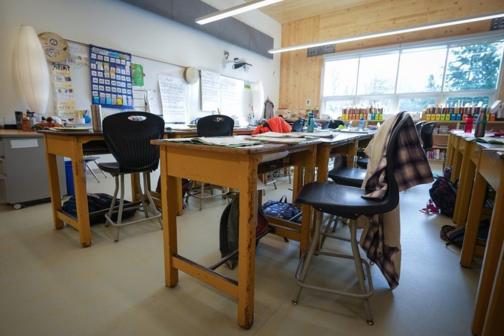 Desks are seen in an elementary school classroom, in Vancouver, B.C., Thursday, April 13, 2023. THE CANADIAN PRESS/Darryl Dyck
