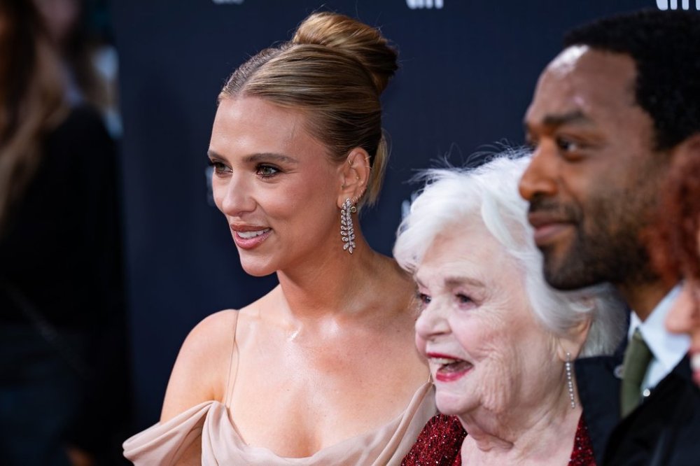 Scarlett Johansson, left, June Squibb and Chiwetel Ejiofor pose for a photo on the red carpet at the premiere of