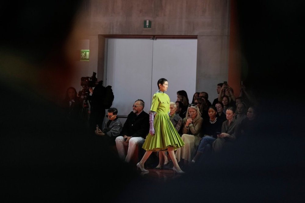 A model wears a creation as part of the Prada Spring/Summer 2026 collection presented in Milan, Italy, Thursday, Sept. 25, 2025. (AP Photo/Luca Bruno)