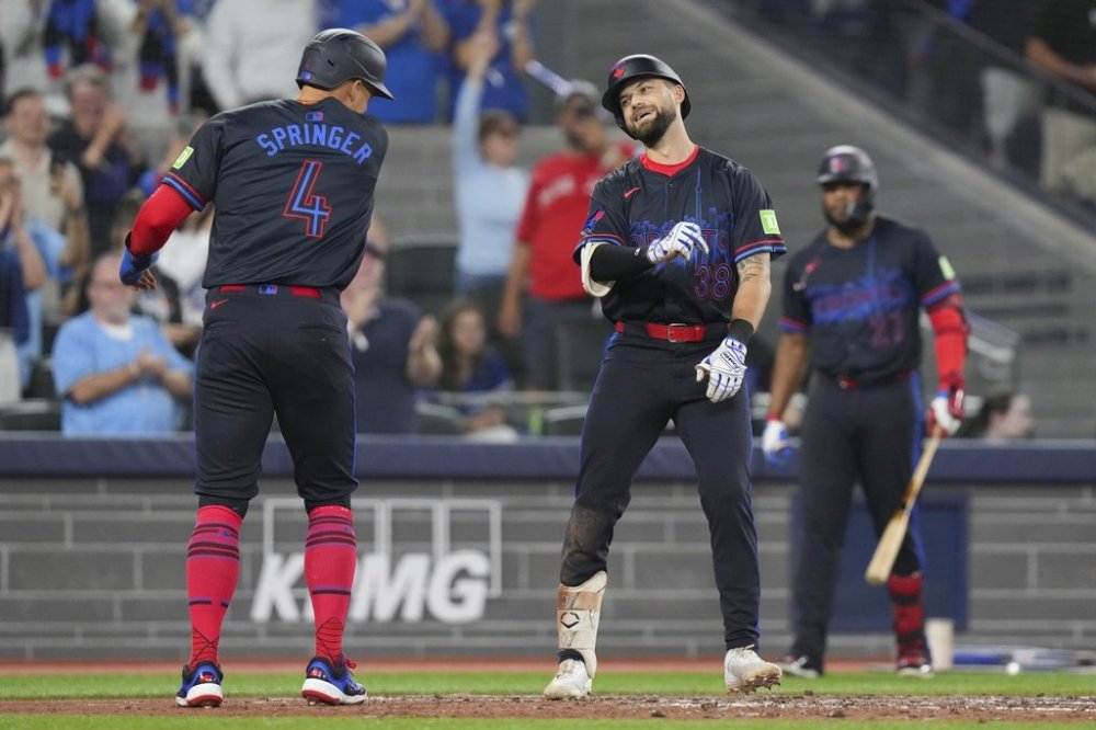 Blue Jays outfielder Nathan Lukes (right) celebrates with teammate George Springer after hitting a two-run home run during the fifth inning of a Major League Baseball game in Toronto on Sept. 26, 2025. THE CANADIAN PRESS/Chris Young
