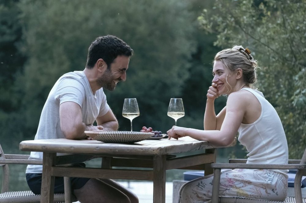 This image released by Apple TV+ shows Brett Goldstein, left, and Imogen Poots in a scene from