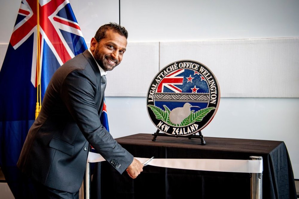 FILE - In this photo released by the US Embassy in Wellington, New Zealand, FBI Director Kash Patel cuts the ribbon at the official opening of the FBI office in Wellington, New Zealand, July 31, 2025. (Ola Thorsen/US Embassy via AP, File)