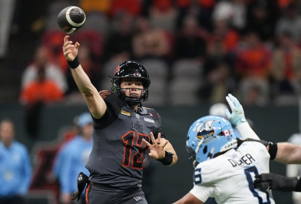 B.C. Lions quarterback Nathan Rourke (12) passes during the first half of a CFL football game against the Toronto Argonauts, in Vancouver, on Friday, September 26, 2025. THE CANADIAN PRESS/Darryl Dyck