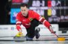 Canada skip Brad Gushue delivers a rock while playing Alberta-Jacobs during the semifinal at the Brier, in Kelowna, B.C., on Sunday, March 9, 2025. THE CANADIAN PRESS/Darryl Dyck