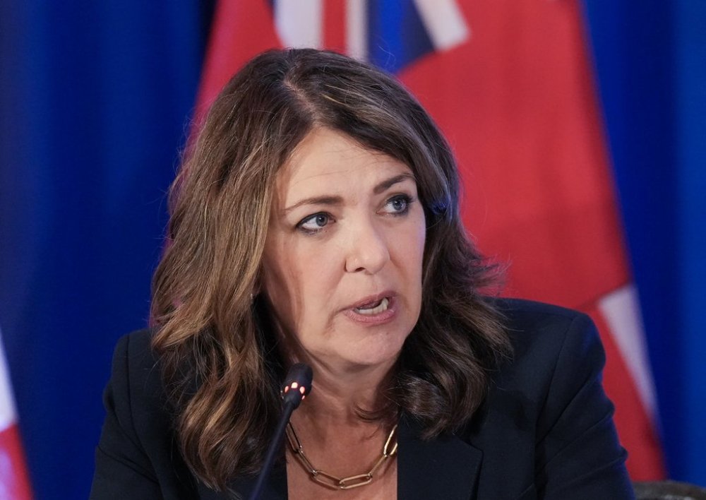 Alberta Premier Danielle Smith answers a question from the media during the 2025 summer meetings of Canada’s premiers at the Deerhurst Resort in Huntsville, Ont., on Wednesday, July 23, 2025. THE CANADIAN PRESS/Nathan Denette