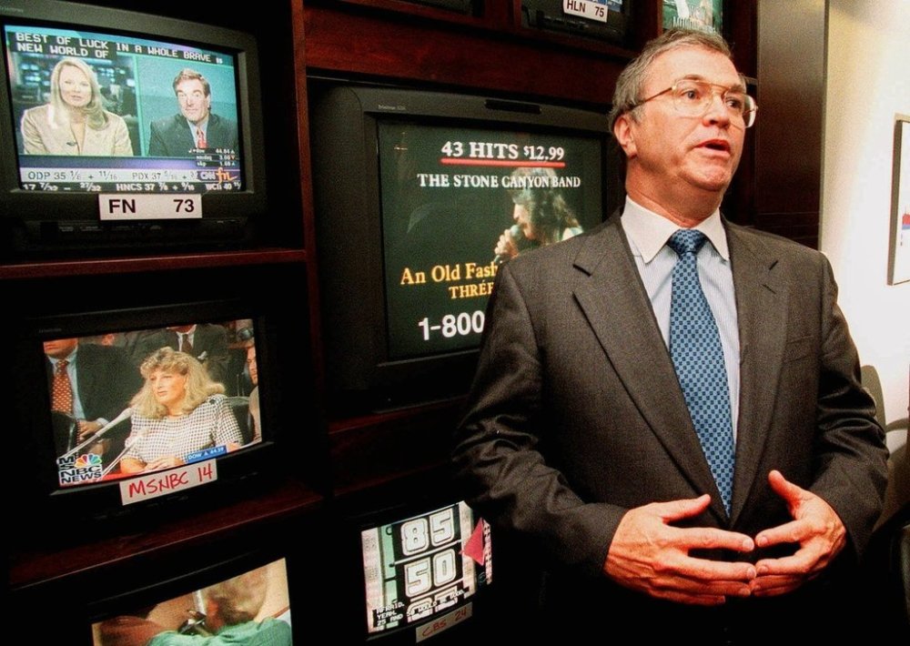 FILE - CNN CEO Tom Johnson talks about the network's retracted story about U.S. military use of nerve gas against Vietnam War defectors in his office at CNN's headquarters in Atlanta on July 6, 1998. Johnson said,