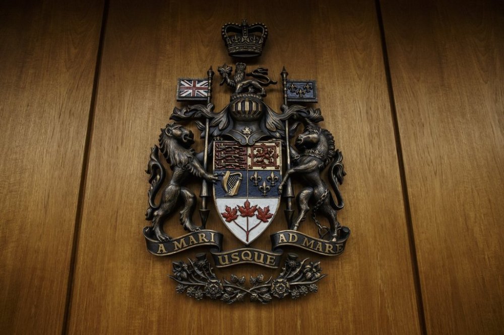 The Alberta Coat of Arms is shown at the Edmonton Law Courts building, in Edmonton on June 28, 2019. THE CANADIAN PRESS/Jason Franson