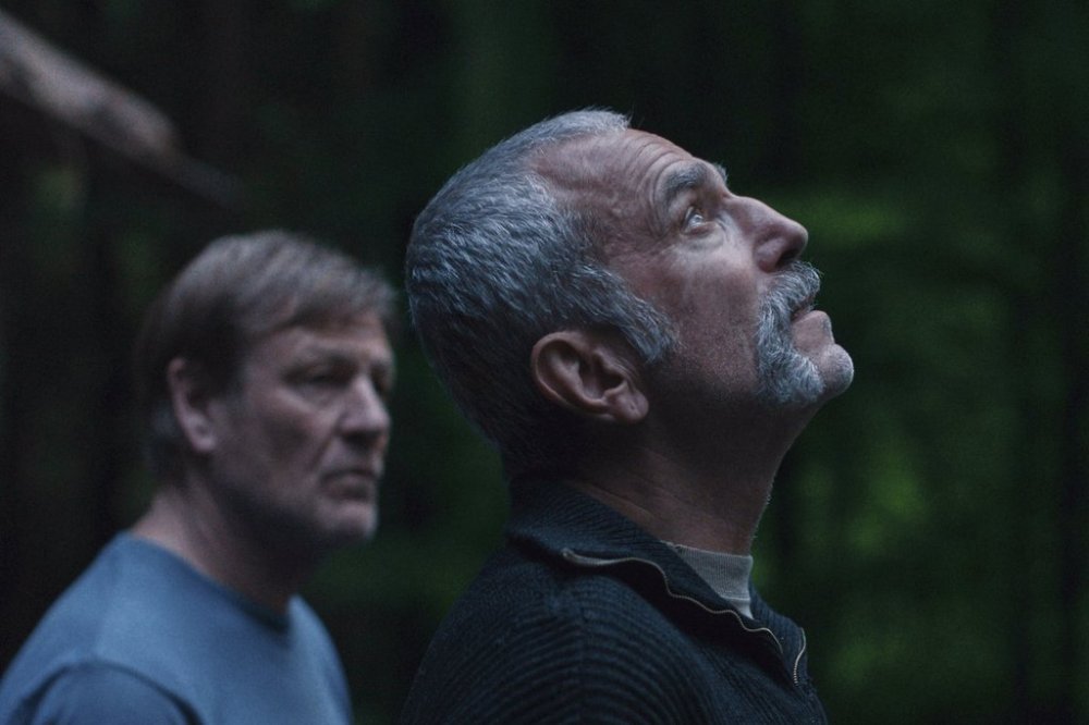 This image released by Focus Features shows Sean Bean, left, and Daniel Day-Lewis in a scene from