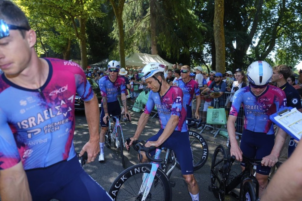 Israel - Premier Tech riders wait for the start of the ninth stage of the Tour de France cycling race over 174.1 kilometres (108 miles) with start in Chinon and finish in Chateauroux, France, Sunday, July 13, 2025. (AP Photo/Mosa'ab Elshamy)